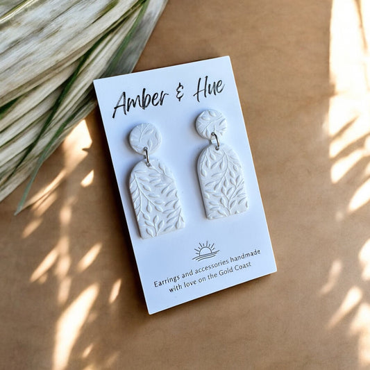 Leaf Imprint White Tall Arch Dangle Earrings