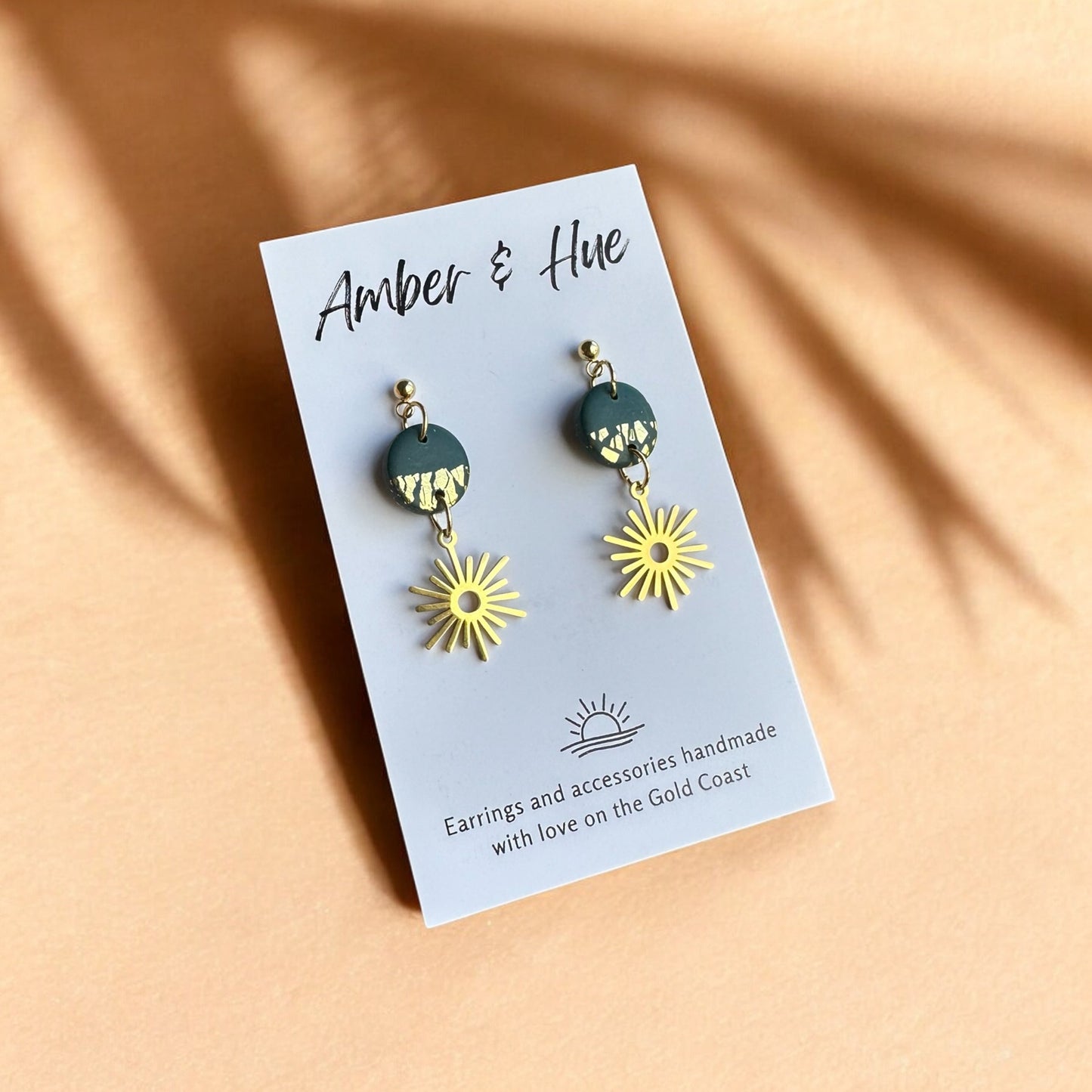 Green and Large Gold Sun Charm Dangle Earrings