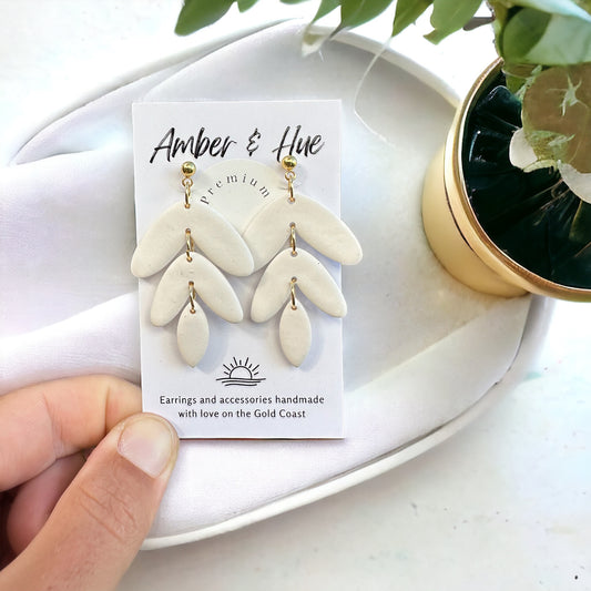 Three Tiered White Dangle Earrings