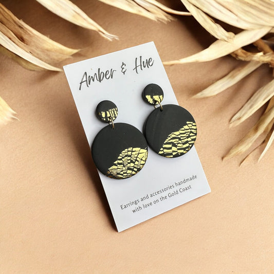 Circular Black and Gold Dangle Earrings