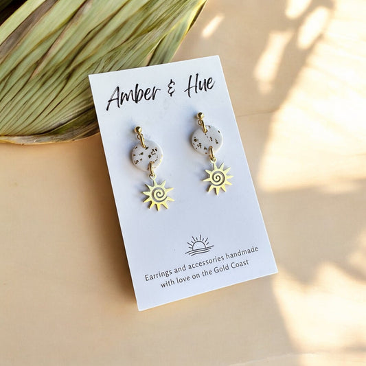 Dangle Earrings With a Sun Charm White & Gold