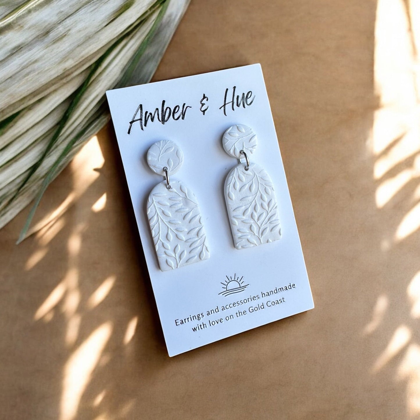 Leaf Imprint White Tall Arch Dangle Earrings