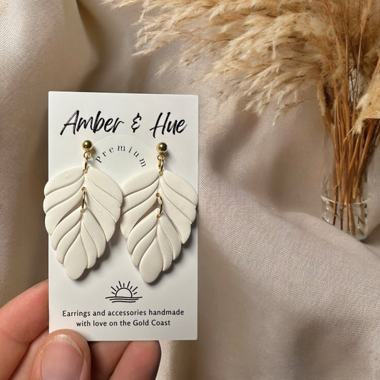Heavenly Dangle Earrings White
